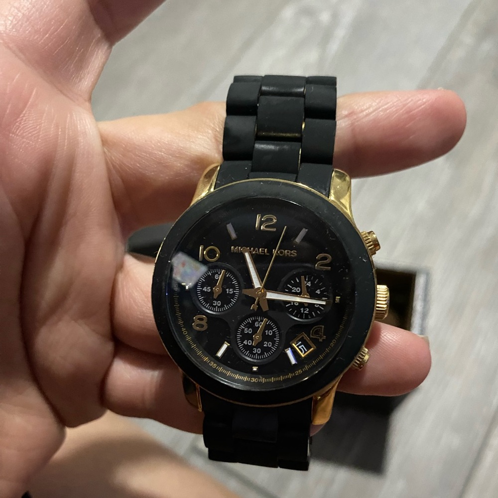 Black and gold watch